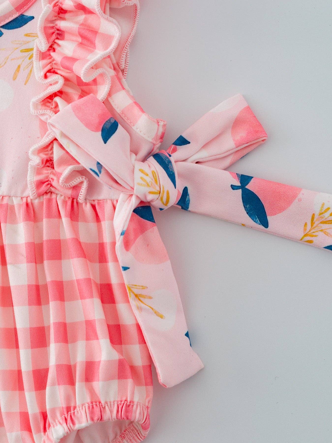 Rylee Faith: Peach Plaid Bow Ruffle Girls Romper