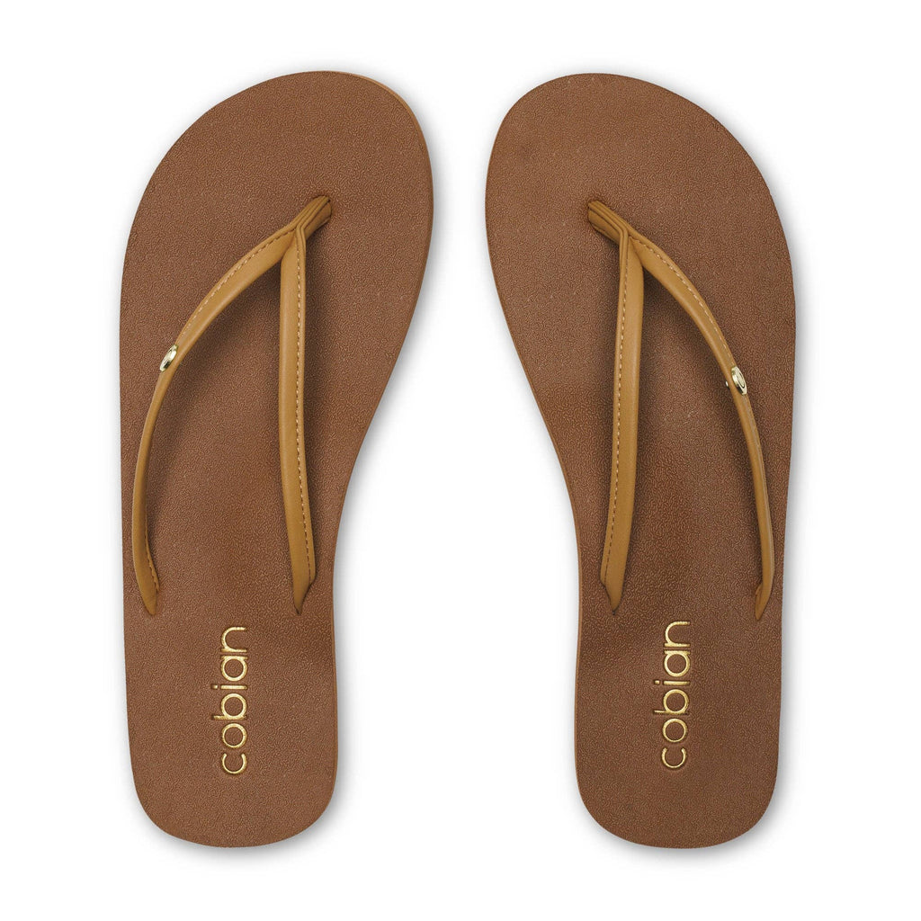 Cobian: Women's Nias Bounce Casual Flip Flop Sandal - Tan
